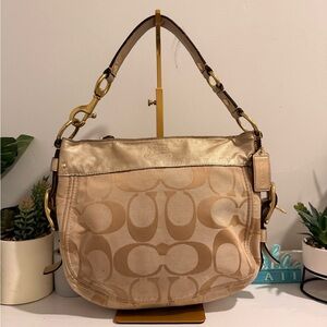 Vintage Coach Zoe Hobo
-Coach Metallic Gold and Tan Shoulder Bag
